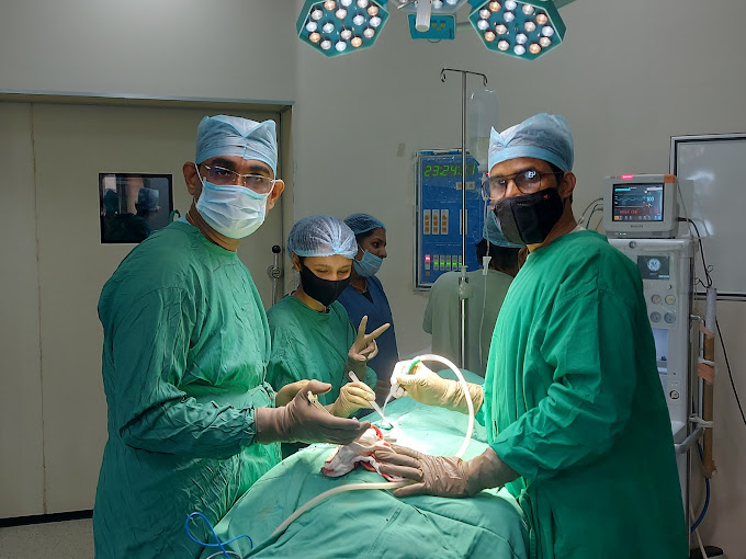 Dr. Girish Gupta performing orthopedic consultation